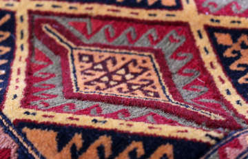 Thin woven Afghan rugs to