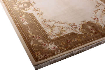 Desenleri İpek Kahverengi Kenarlı Halı