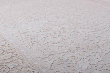 Kabartma Desenli Kemik Rengi Halı